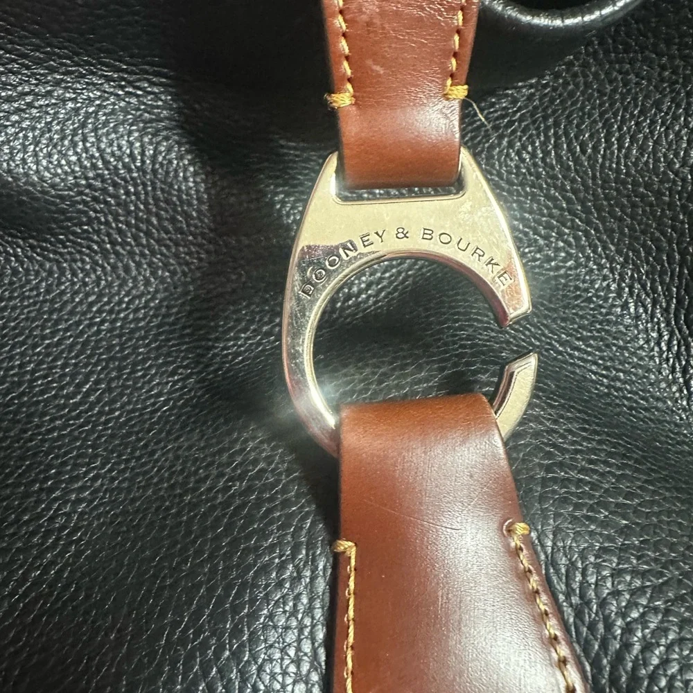 Dooney & Bourke black & brown leather shoulder bag with gold “C” ring/clasp. - Picture 13 of 13